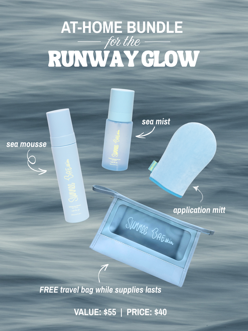 Sunnee BAEskin At-Home Runway Glow Tanning bundle with sea mousse, sea mist, application mitt, and travel bag on a water background.