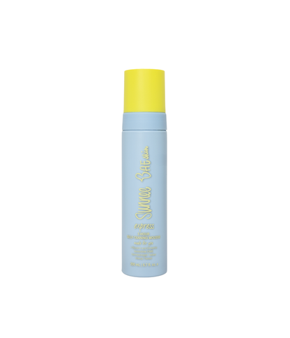 Blue bottle of express mousse with yellow cap on a white background
